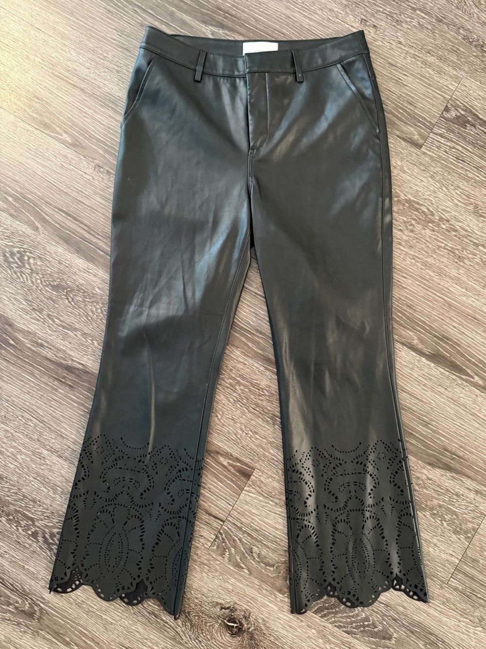 Anthropologie laser-cut faux leather trousers